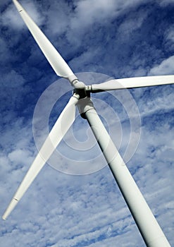 SINGLE WIND TURBINE WITH BLUE SKY