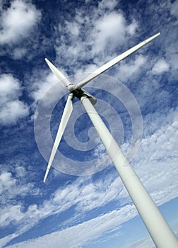 SINGLE WIND TURBINE WITH BLUE SKY