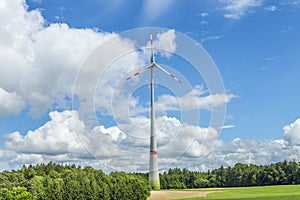 Single wind turbine in the field in rural area in Bavaria