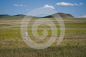 Single woman in steppe