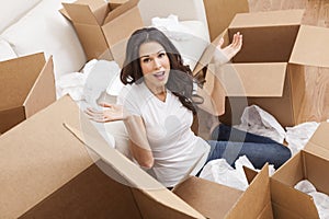 Single Woman Unpacking Boxes Moving House