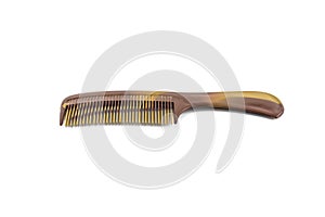 Single wood comb on white background