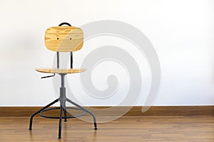 Single  wood stool on wooden floor