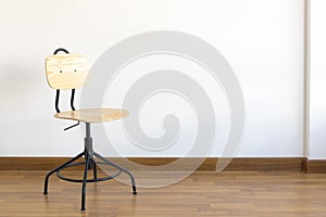 Single  wood stool on wooden floor