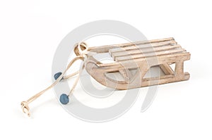 Single wooden sledge isolated on white background