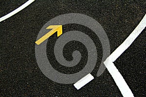 single yellow arrow pointing away from the gap