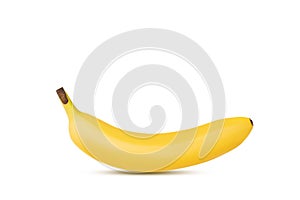 Single yellow banana isolated against a white background