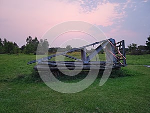 Singular rustic trailer sunset