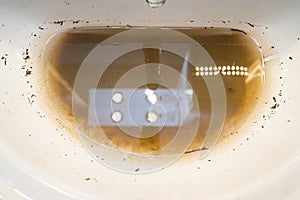 sink with dirty water because of the blockage.