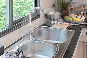 sink with faucet in kitchen room