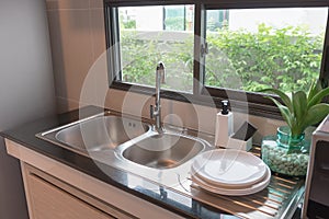 sink with faucet in kitchen room