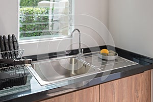 sink with faucet in kitchen room