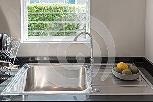 sink with faucet in kitchen room