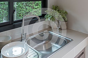 sink with faucet in kitchen room