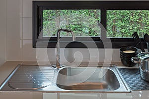 sink with faucet in kitchen room