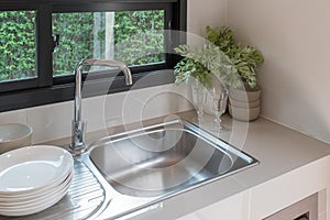 sink with faucet in kitchen room