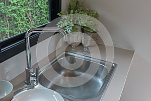 sink with faucet in kitchen room