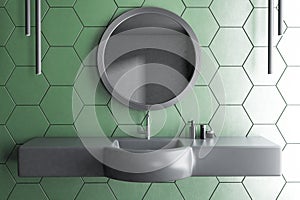 Sink in green tile bathroom