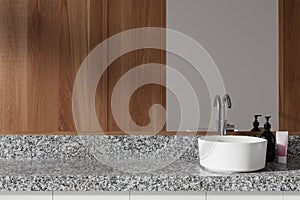 Sink and mirror in wooden bathroom