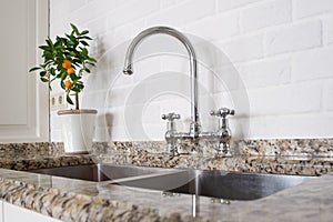 Sink and mixer faucet in kitchen