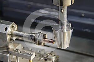 The sinker EDM machine operation with the copper electrode