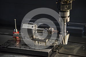 The sinker EDM machine operation with mold insert part.