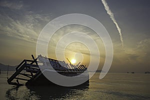 Sinking boat in the sea