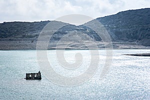 The sinking church in the dam of Bramiana in Ierapetra, Crete.