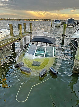 Sinking Power Boat in Marina