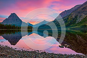 Sinopah Mountain and its reflection in Two Medicine Lake.Glacier National Park.Montana.USA photo