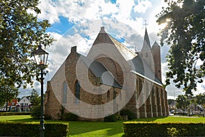 Sint Jacobus Church in Renesse, Zeeland, Netherlands with sun