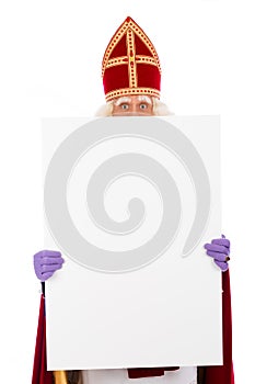 Sinterklaas holding placard