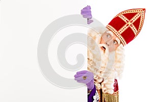 Sinterklaas looking on advertisement