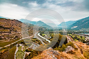 Sion, Switzerland: The valley of the Rhone river and vineyards seen from Tourbillon Castle hill, canton Valais