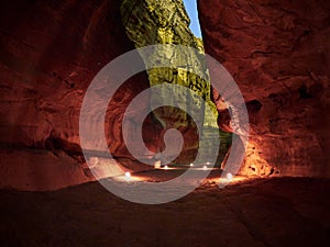 The Siq canyon in Petra during night walk, Jordan, Middle East