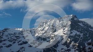 Sirac mountain peaks Ecrins National Park with passing clouds. Valgaudemar, Hautes-Alpes,Alps, France