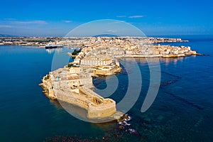 Siracusa, Ortigia Island from the air, Sicily, Italy. Isola di Ortigia, coast of Ortigia island at city of Syracuse, Sicily, Italy photo