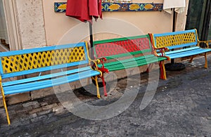 Siracusa - Panchine colorate tra i vicoli di Ortigia photo