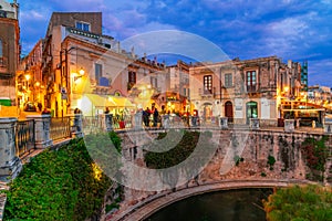 Siracusa, Sicily island, Italy: Night view of the Fountain of Arethusa, Ortigia, Syracuse photo