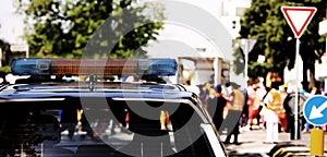 Sirens of a police car with during a demonstration w