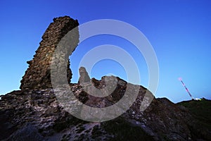 Siria Medieval Fortress in Arad County at sunset.