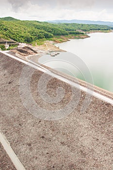 Sirikit Dam from above. The Sirikit Dam is an embankment dam on