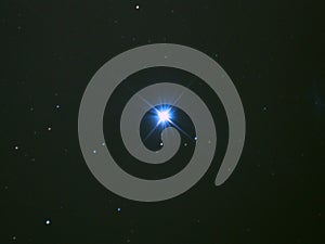 Sirius star in night sky photo