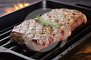 sirloin steak with grill marks on a cast iron pan