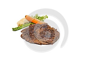 Sirloin steak, served with asparagus, grilled carrot