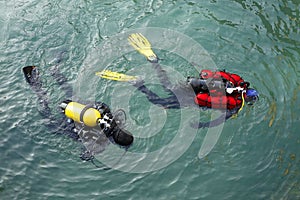 SIRMIONE, ITALY, - OCTOBER 28, 2021 - Scuba divers workers underwater archaeology works at Lago di Garda.