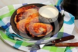 Sirniki or traditional russian pancakes from cottage cheese