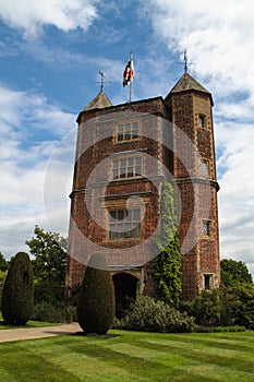 Sissinghurst Castle Tower White Clouds Blue Sky Background photo
