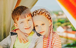 Sister brother relationships. Kids playing outdoor. Summer camping. Children in homemade tent. Cute kids camping. Having