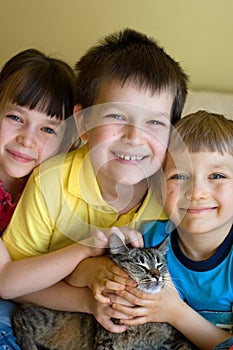 Sister, brothers and cat